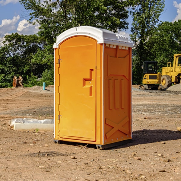 how often are the porta potties cleaned and serviced during a rental period in Winslow